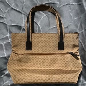 Authentic Brown canvas Gucci guccissima small bag.